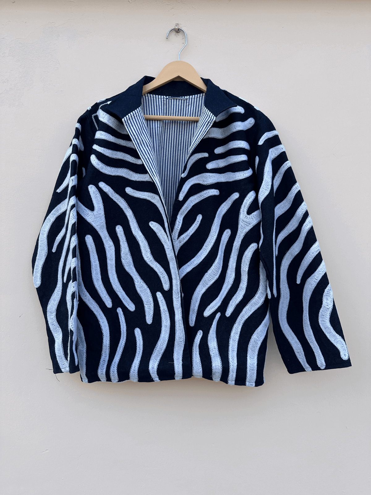 Indigo-Wave-Embroidered-Denim-Jacket-with-Striped-Lining